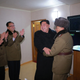 Kim Jong Un reacts to a test of the newly developed inter-continental ballistic rocket Hwasong-15.